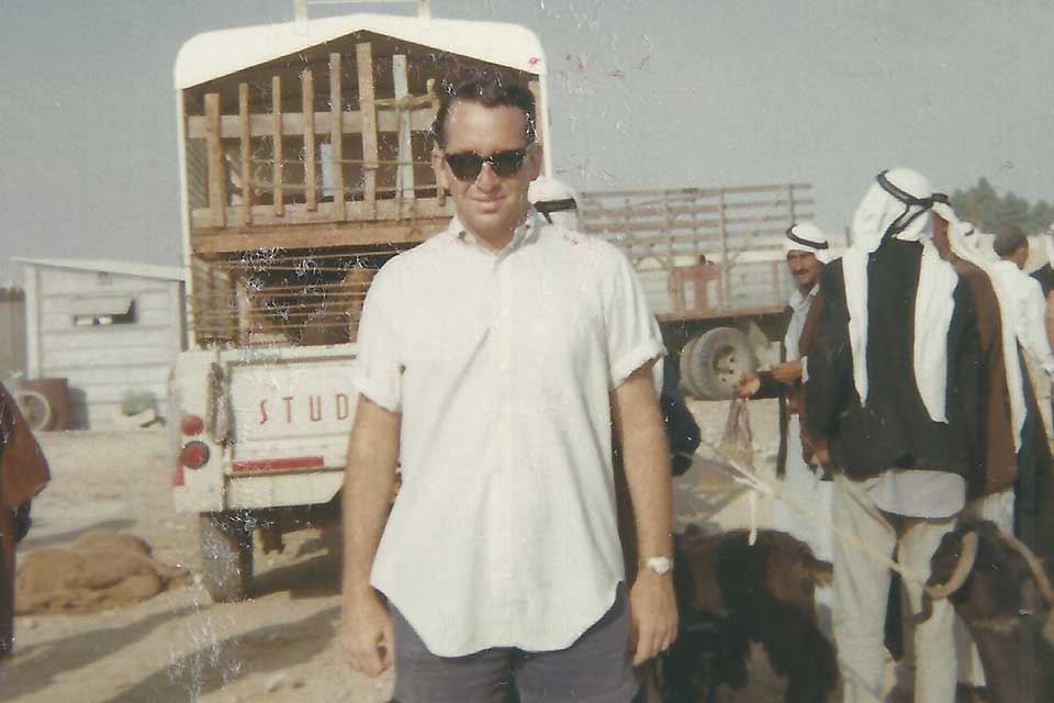 Ron Kronish in front of a truck in Israel in 1968